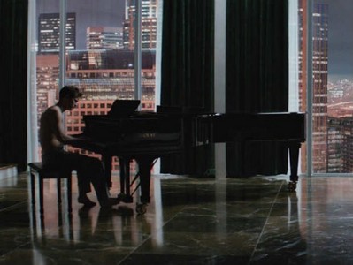  Christian Grey(Jamie Dornan) in his living room with a panoramic view<3
