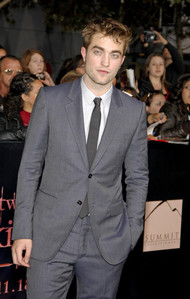  Robert looking sinfully sexy in a grey suit<3