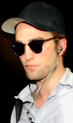 my handsome babe with earbuds<3