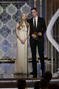  my beautiful babe Robert on a stage with Amanda Seyfried<3
