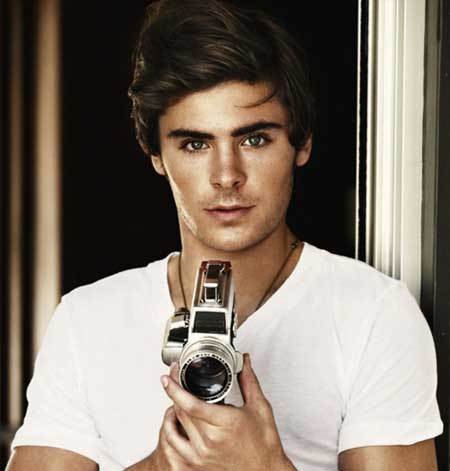  Efron has a beautiful head of hair<3