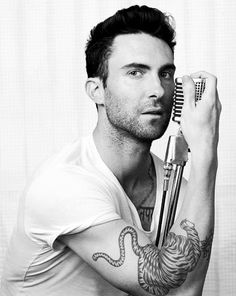 Adam Levine with a mike<3