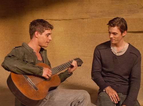  Max Irons with a guitar,as his Host co-star,Jake Abel looks on<3