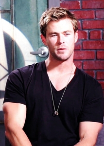  Chris wearing a nice black t-shirt,which shows off his sexy Aussie arms<3