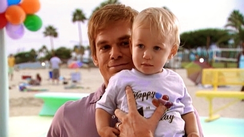 Michael C. Hall and his onscreen son who is played by twins Evan and Luke Kruntchev.