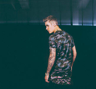 Justin in a camoflauge shirt