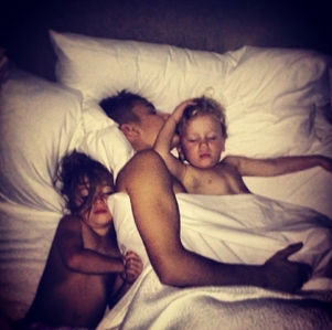  Justin in a room with his brother and sister