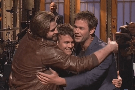  Chris in a brotherly group hug with brothers Luke and Liam.I wanna be a part of that hunky hug of hotness<3
