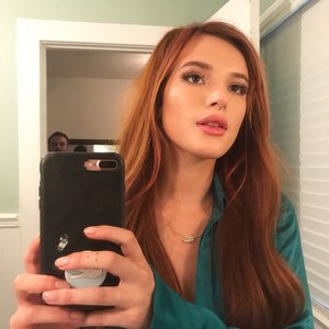  I'm guessing dead ones don't count because if they did I would've picked Judy Garland. So out of living ones, I'd say Bella Thorne. She's so honest, chill, doesn't give a crap what anyone thinks, is an amazing actress, has a good Canto voice (Not great), and is probably the most beautiful woman I've ever seen.