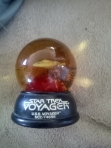 I have a vitage Star Trek U.S.S.Voyager Globe made from awillaby & Ward. ©MBI2011 CBS Studios if you're interested