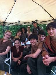 post behind the scenes pic from the hunger games or just hanging out.
