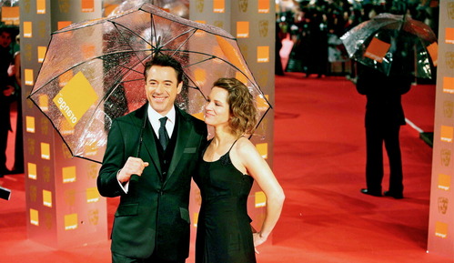  Post a pic of your fav actor holding an umbrella!