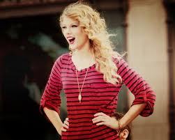 Post a pic of tay in a cute red tee! Go Now!