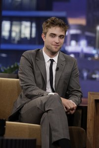  Post a pic of your actor with his legs crossed.Mine is of my Robert<3