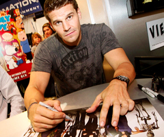  Post a pic of a hot actor signing autographs.