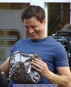  Post a picture of an actor laughing uncontrollably.