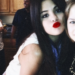 Post a pic of Selena with red lipstick 