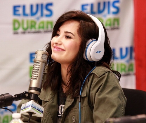 Post a pic of Demi with headphones! Props <3