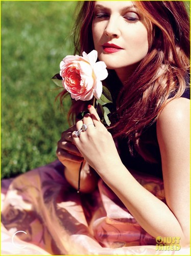  Post a pic of U're fav actress holding a flower..0_o
