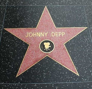 Post a picture of an actors star on the walk of fame