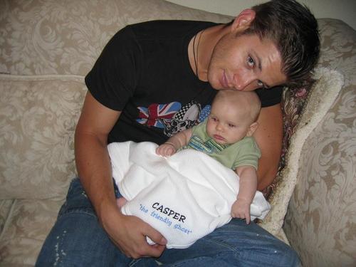  Post a pic of your actor holding a baby.