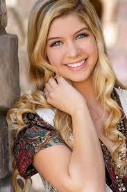  who Is the girl Ho as the most beutiful smile of ant farm school of talents ?