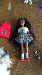  What's this doll and what's the value? 1991 Mattel thank anda