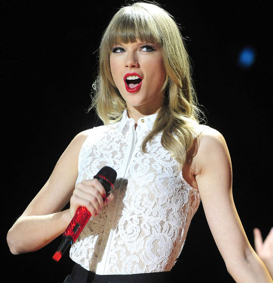 Taylor Swift performing on Red tour