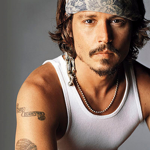  Johnny Depp is playing the role of Will opposite Rebecca Hall in "Transcendence".