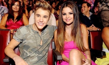  'I’m becoming a woman, wanting to dress lebih mature and be comfortable in my own body': Selena Gomez pictured with Justin Bieber at the Teen Choice Awards last July.