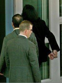  Michael Arriving At The Santa Monica Sheriff's Department In Handcuffs