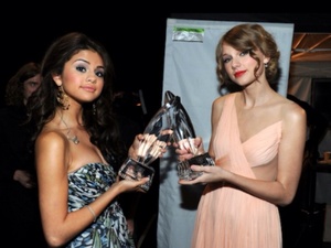  Taylor nhanh, swift and Selena Gomez with awards. In future,it could be Tay for acting.