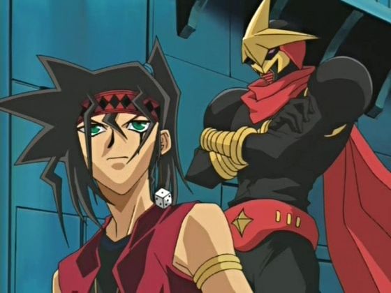 Duke is dueling in this picture with the help of some of Yugi's friends!