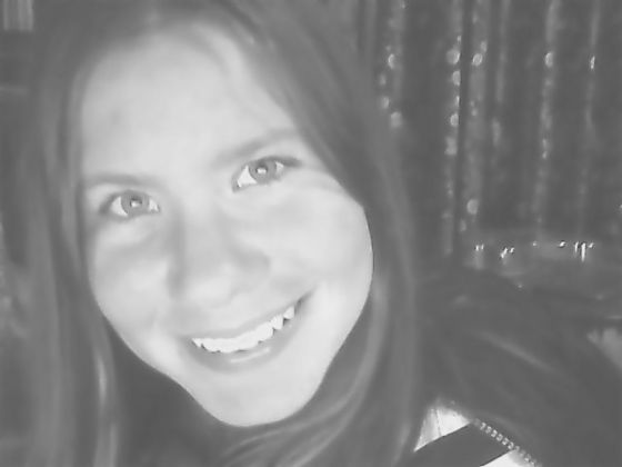 This is me (not a very good photo because it's black and white) I think this photo was taken last year or something, I look younger