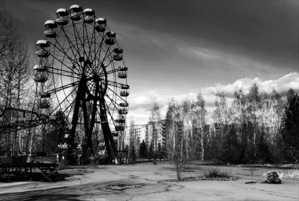 The Ferris wheel that looms eerily as a somber reminder of the May Day celebrations that were never to be.