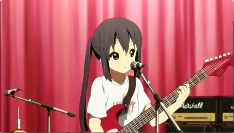 Azusa Nakano loves music (and so do the rest of the girls in K-On!).

Give me a character with a sp