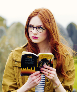  Amy Pond from Doctor Who Both are wearing glasses.