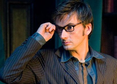  tenth doctor from doctor who both are touching their glasses