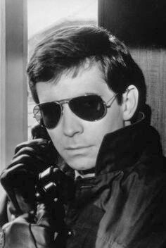 Robert Macklin from Five Miles to Midnight 

Both are wearing sunglasses 
