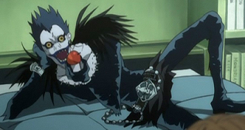 Ryuk from Death Note

Both are holding an apple 