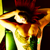  Hawk gets his tattoo's 'hawk upgraded to red when he changes his own 'hawk. Talk about commitment. X