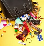 Is it just me or do any of you have everything in your handbag except for what you really need ? *lol