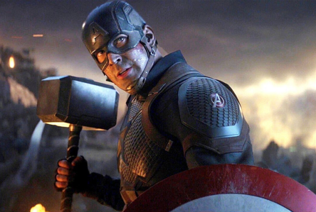  Captain America, holding his shield and Thor’s hammer