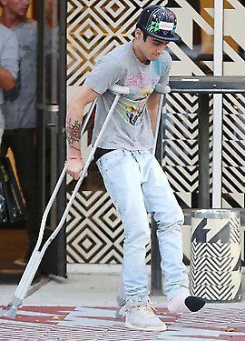  Zayn on crutches
