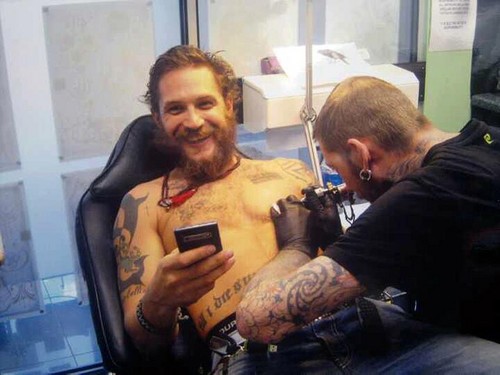  Tom Hardy getting his latest ink..