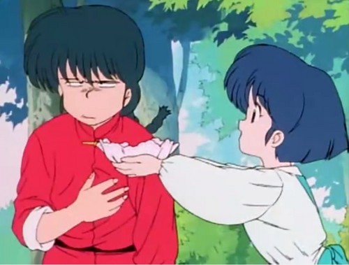  Akane offers ranma cookies. she cant cook, but she's like a cute child wanting approval