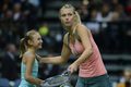Sharapova played with small girl - maria-sharapova photo
