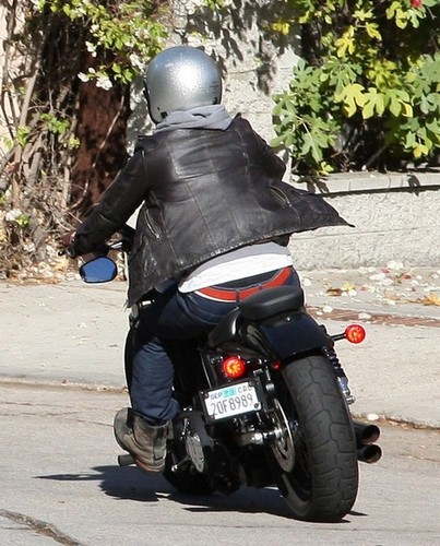  Josh rides his motorcycle through town [19.11.2012]