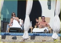 Jennifer and Justin sunbathing in Los Cabos, Mexico (28.12.2012)  - jennifer-aniston photo