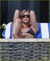 Jennifer and Justin sunbathing in Los Cabos, Mexico (29.12.2012)  - jennifer-aniston photo